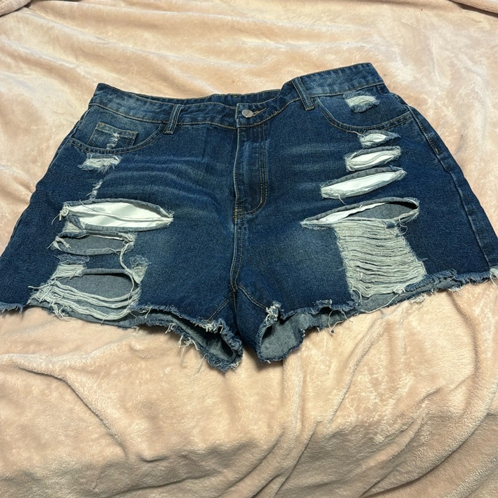 Dark distressed jean short